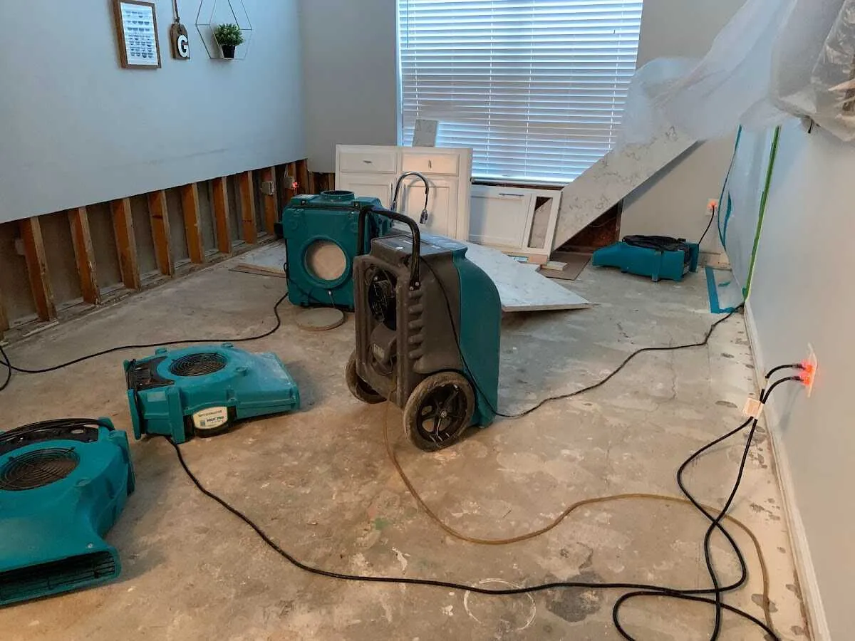 Dehumidifier in flood-cut room for Water Damage Restoration in Northchase